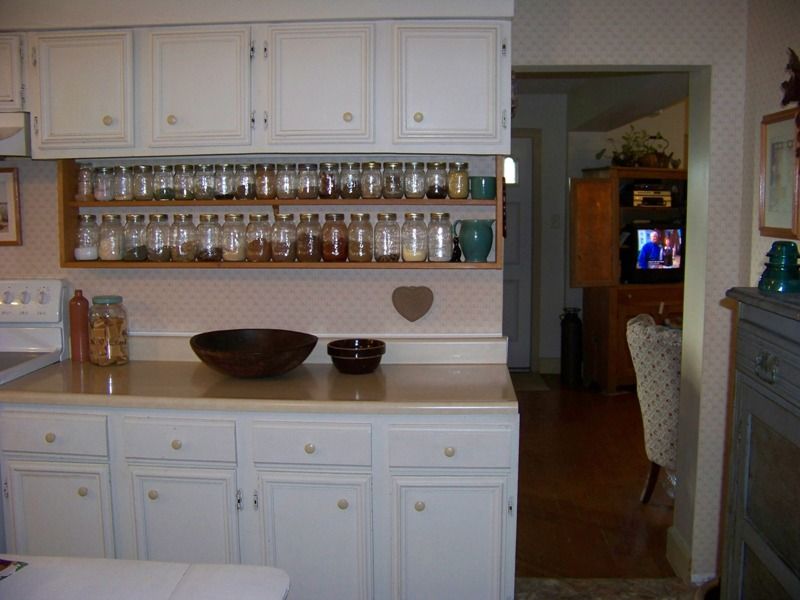 Open shelves under an upper